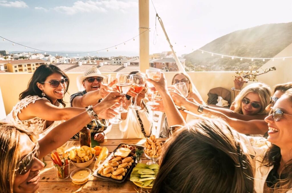 group drinking wine outside